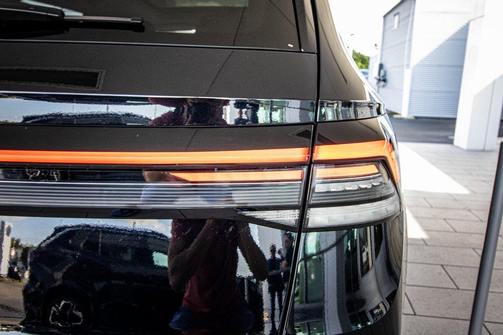 used 2025 Volkswagen Taos car, priced at $24,895