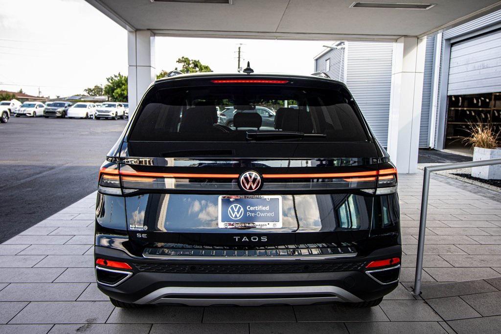 used 2025 Volkswagen Taos car, priced at $24,895