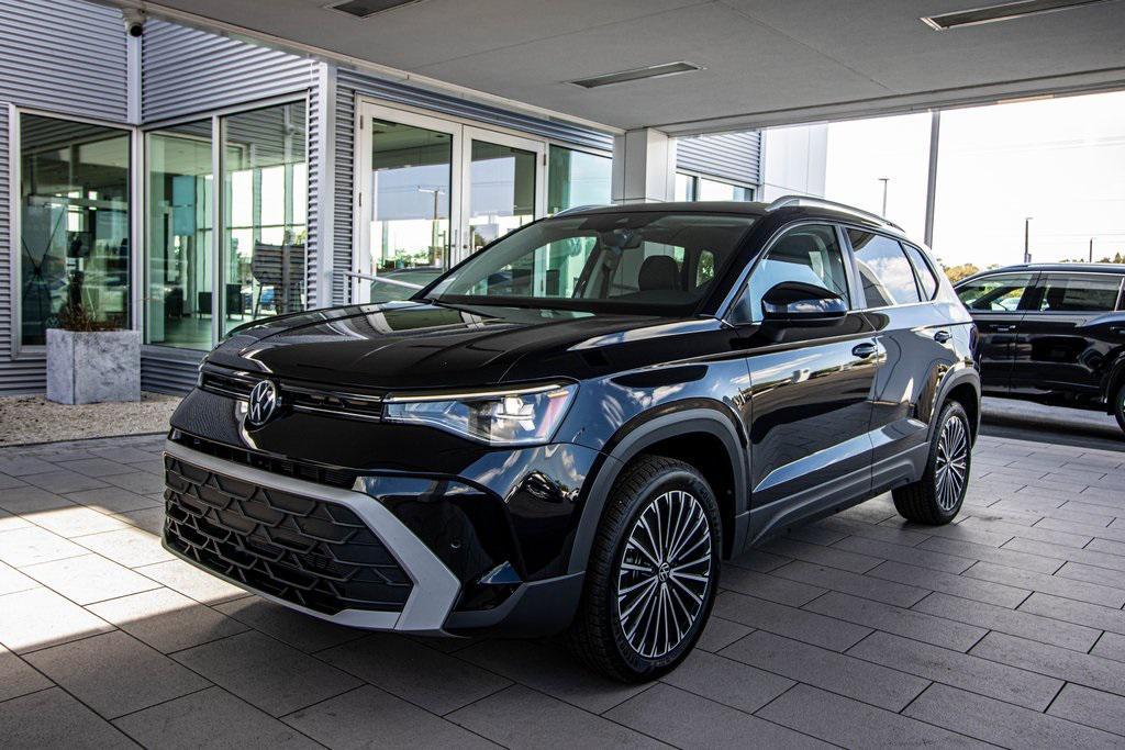 used 2025 Volkswagen Taos car, priced at $24,895