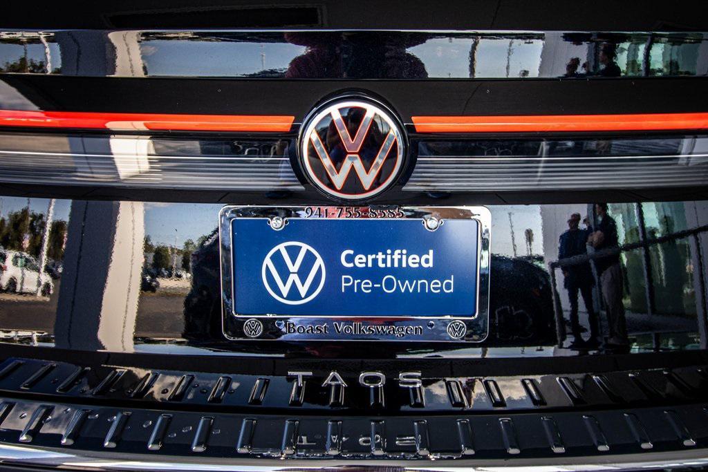 used 2025 Volkswagen Taos car, priced at $24,895