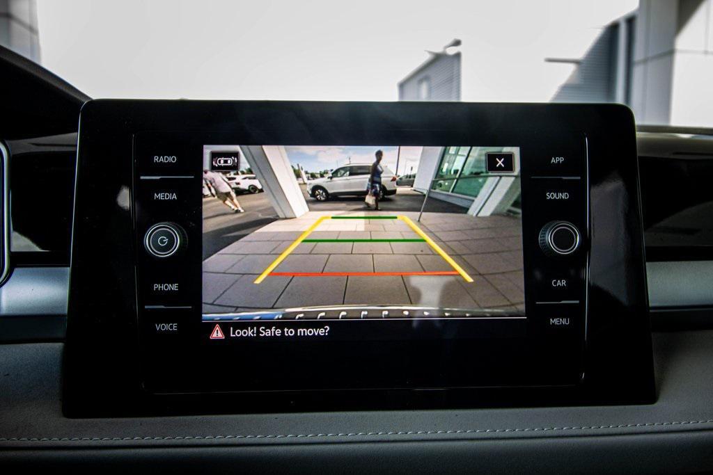 used 2025 Volkswagen Taos car, priced at $25,971