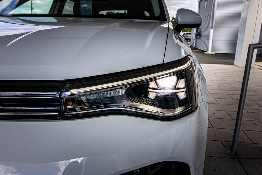 used 2025 Volkswagen Taos car, priced at $25,971