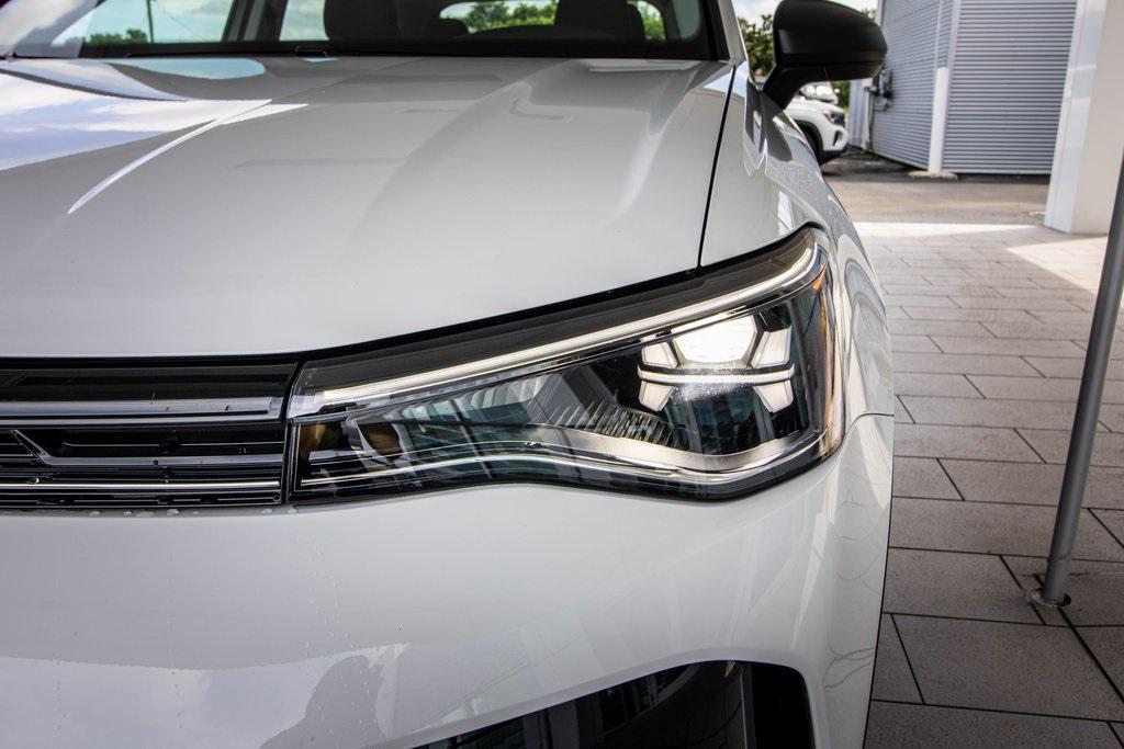 new 2025 Volkswagen Taos car, priced at $26,153