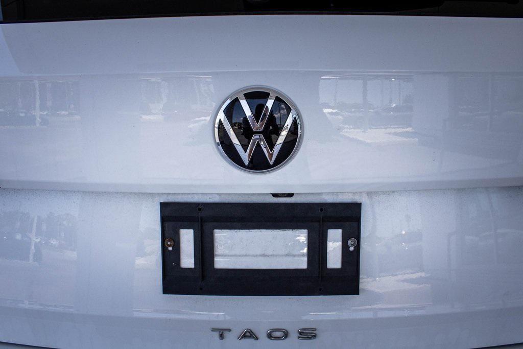 used 2023 Volkswagen Taos car, priced at $22,499