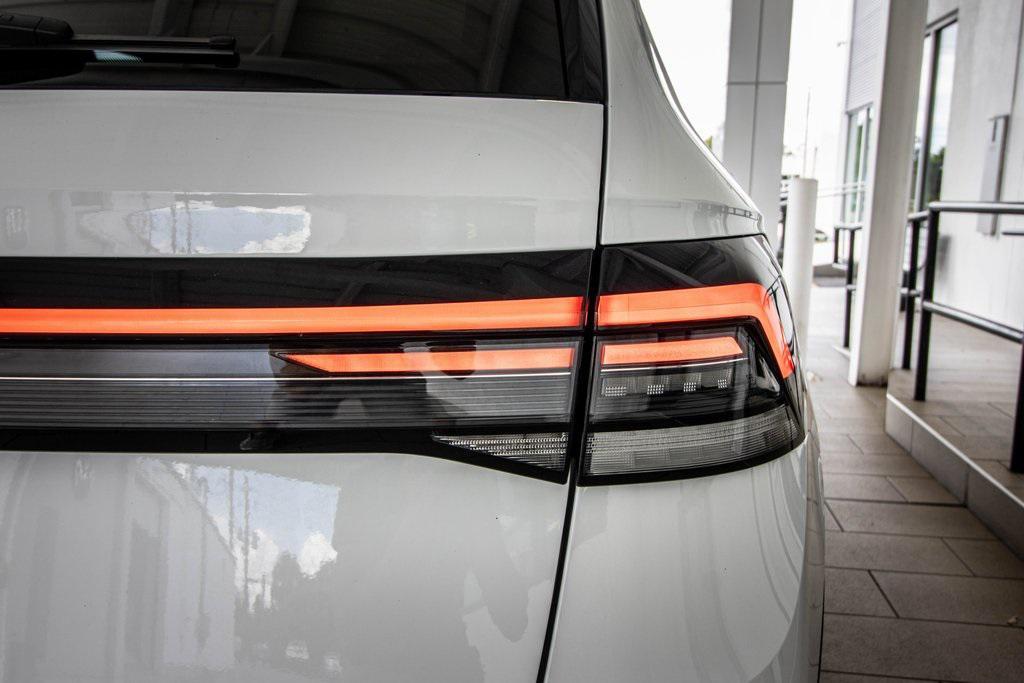 used 2025 Volkswagen Taos car, priced at $25,995