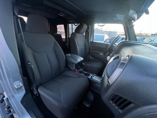 used 2015 Jeep Wrangler Unlimited car, priced at $22,997