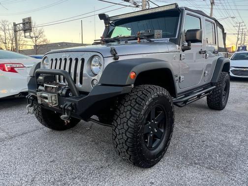 used 2015 Jeep Wrangler Unlimited car, priced at $22,997