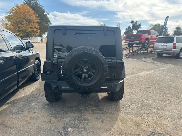 used 2011 Jeep Wrangler Unlimited car, priced at $19,995