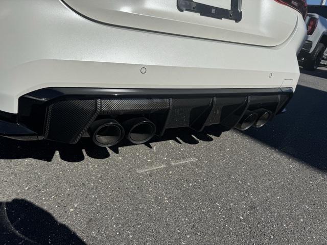 used 2023 BMW M4 car, priced at $70,899