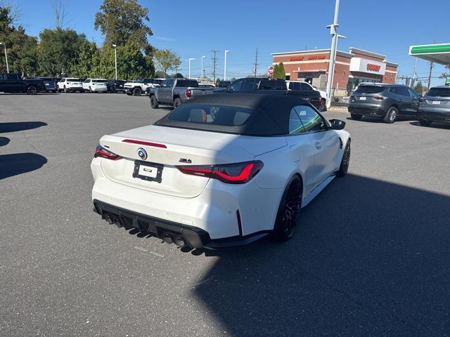 used 2023 BMW M4 car, priced at $70,899