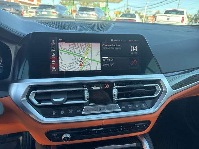 used 2023 BMW M4 car, priced at $70,899