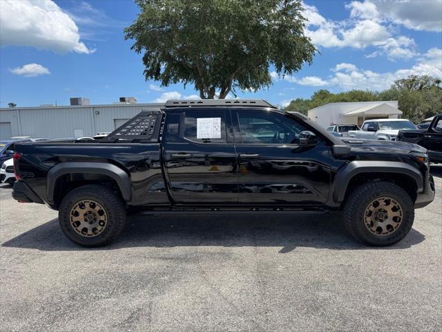 used 2025 Toyota Tacoma Hybrid car, priced at $65,600