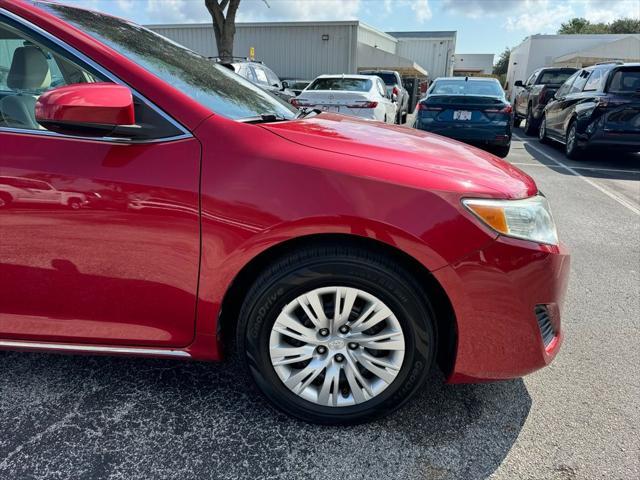 used 2014 Toyota Camry car, priced at $13,900