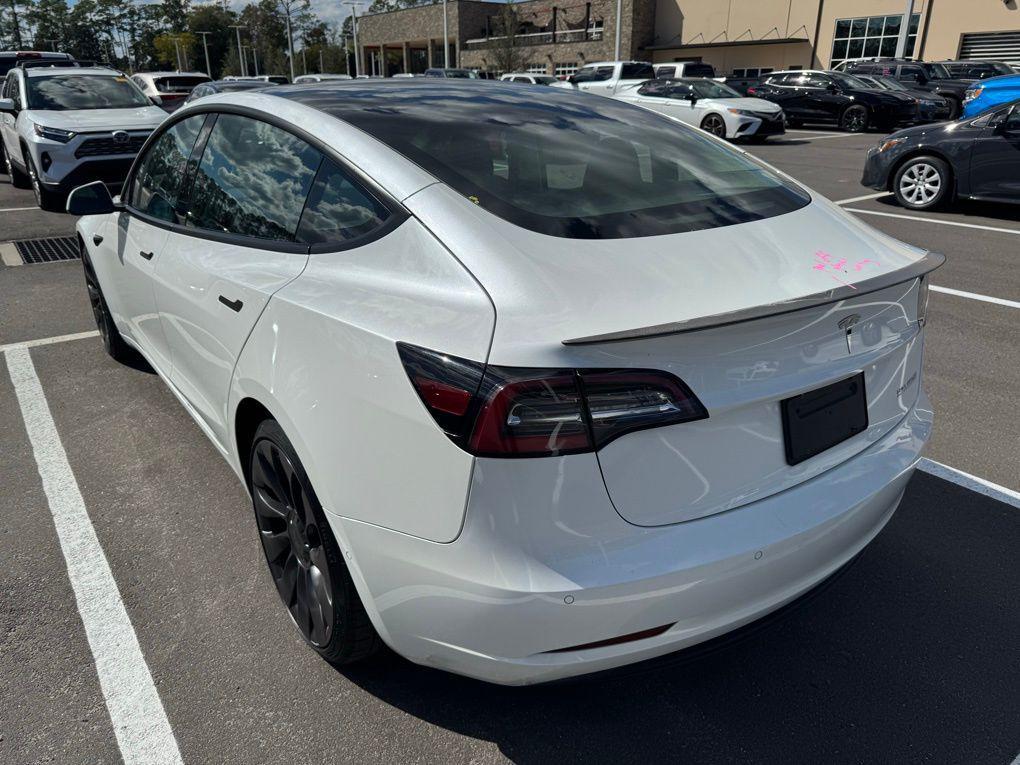 used 2022 Tesla Model 3 car, priced at $27,000