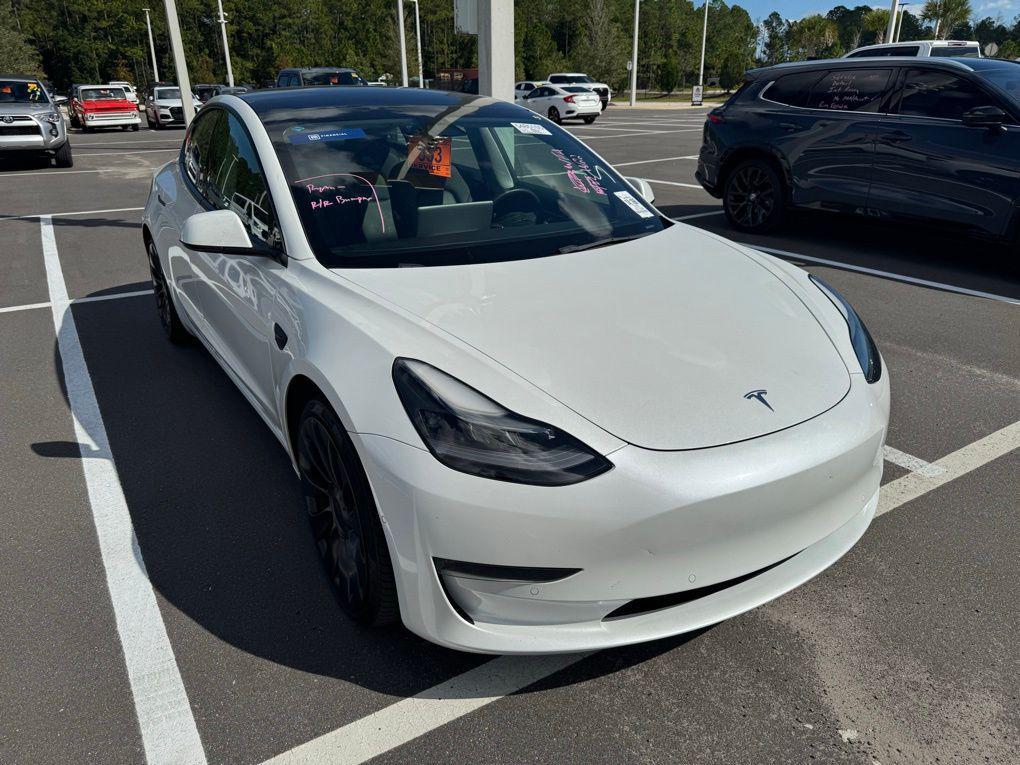 used 2022 Tesla Model 3 car, priced at $27,000
