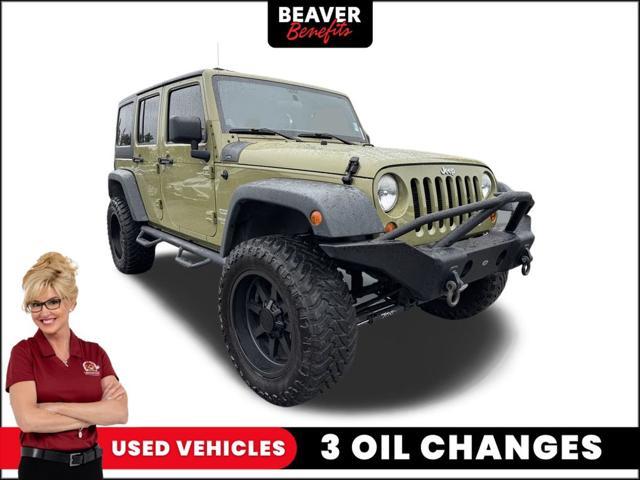 used 2013 Jeep Wrangler Unlimited car, priced at $16,800