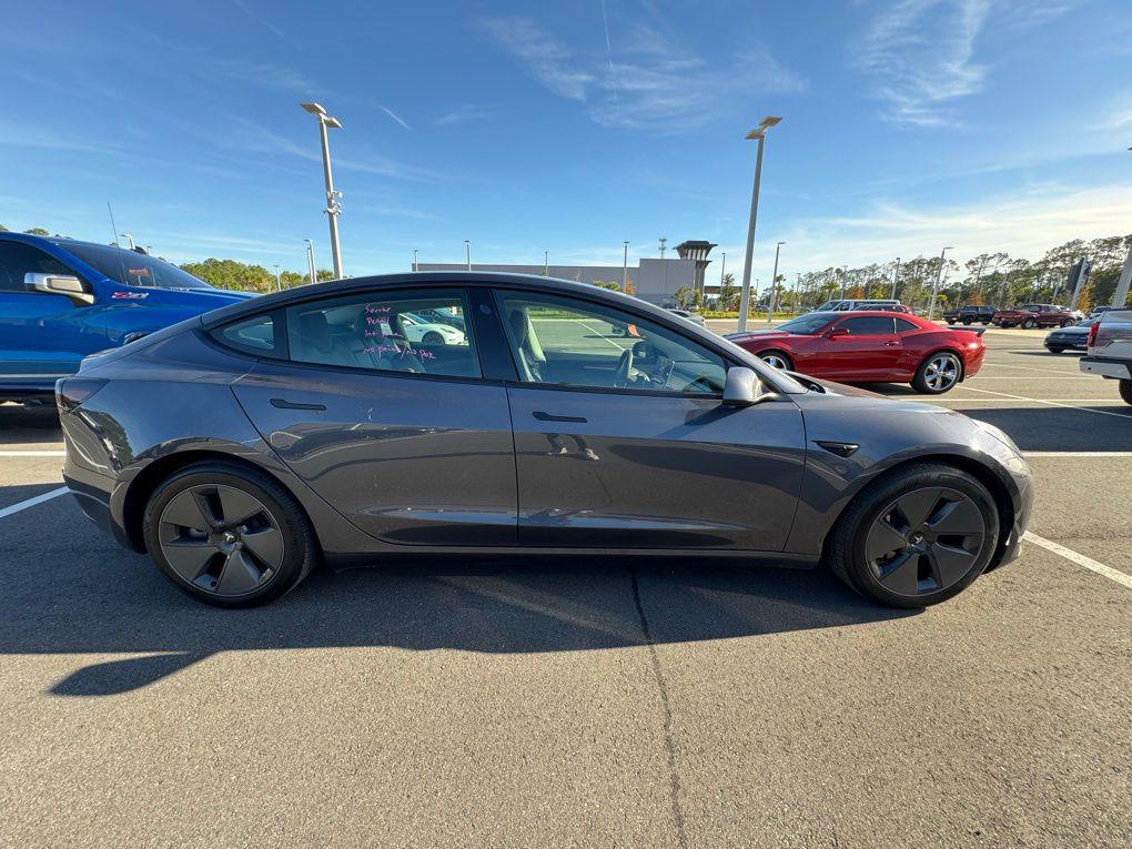 used 2023 Tesla Model 3 car, priced at $26,400