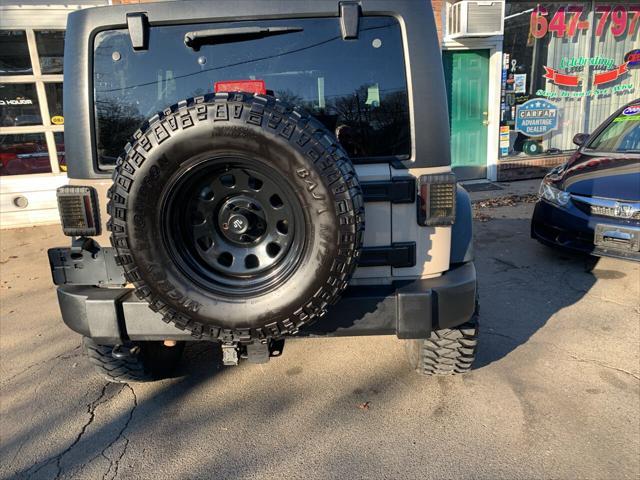 used 2016 Jeep Wrangler Unlimited car, priced at $23,995