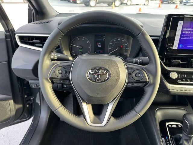 used 2025 Toyota Corolla Hybrid car, priced at $27,588