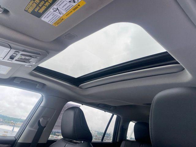 used 2024 Toyota Highlander Hybrid car, priced at $48,988
