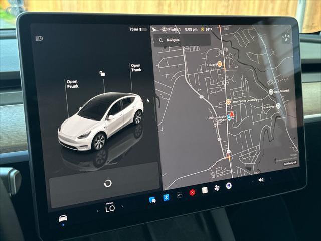 used 2023 Tesla Model Y car, priced at $33,398