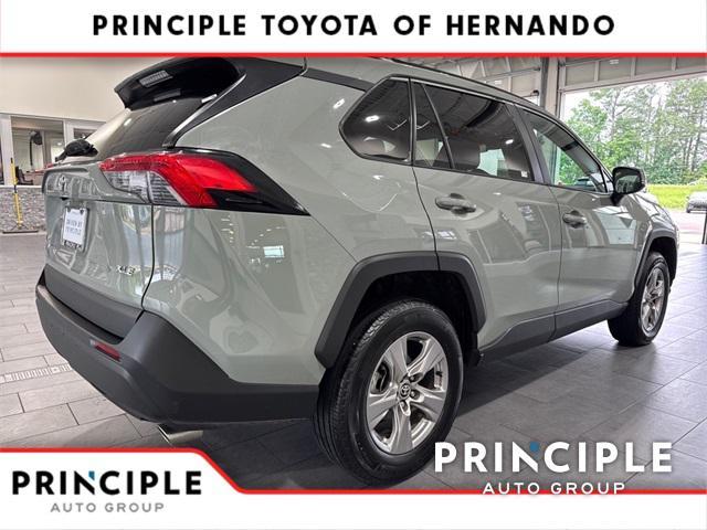 used 2023 Toyota RAV4 car, priced at $30,000