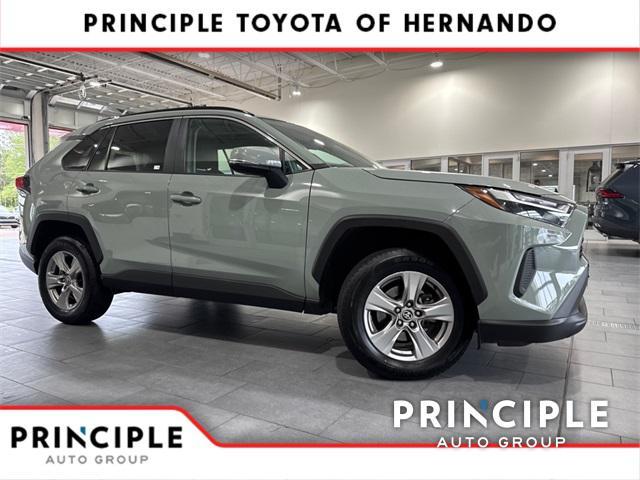 used 2023 Toyota RAV4 car, priced at $30,000