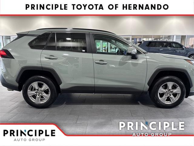 used 2023 Toyota RAV4 car, priced at $30,000