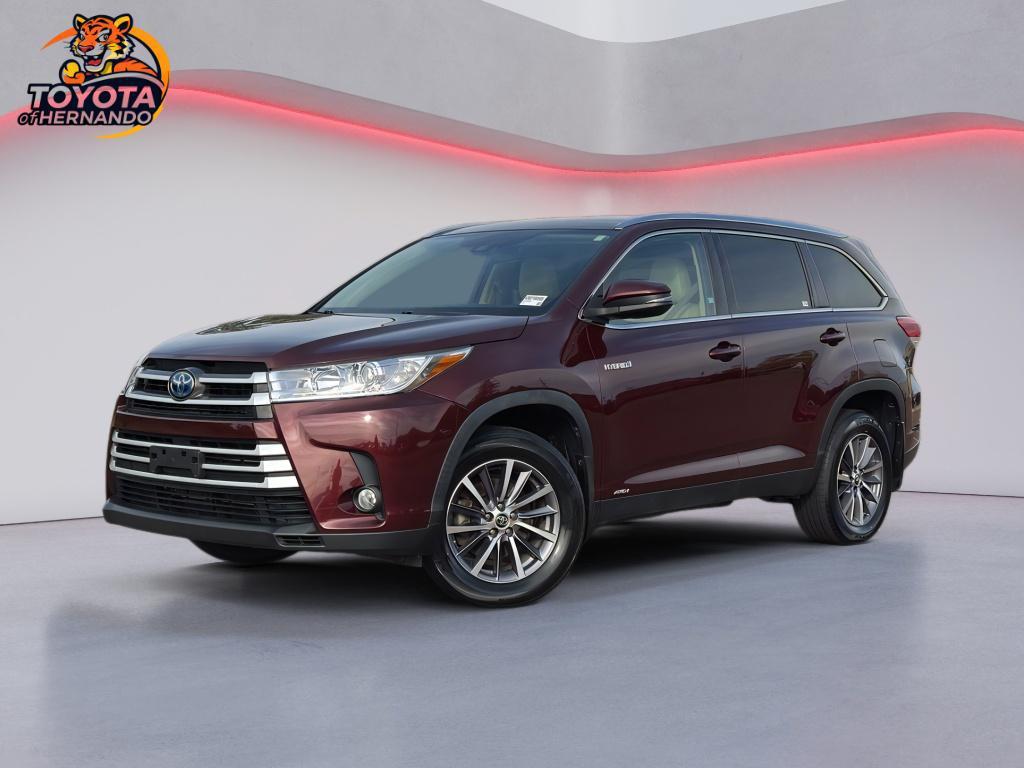 used 2019 Toyota Highlander Hybrid car, priced at $26,579