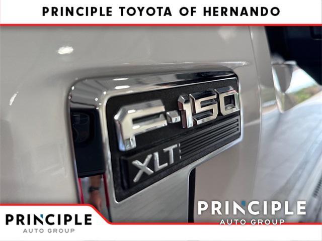 used 2023 Ford F-150 car, priced at $42,063