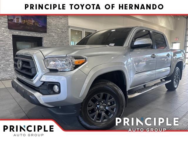 used 2023 Toyota Tacoma car, priced at $34,000