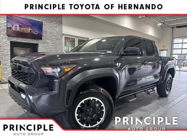 used 2024 Toyota Tacoma car, priced at $42,990