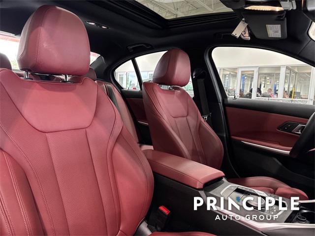 used 2024 BMW 330e car, priced at $39,134