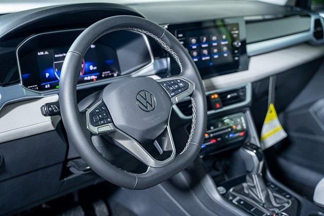 new 2025 Volkswagen Taos car, priced at $32,974