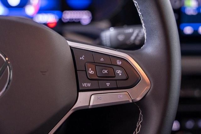 used 2024 Volkswagen Taos car, priced at $25,653