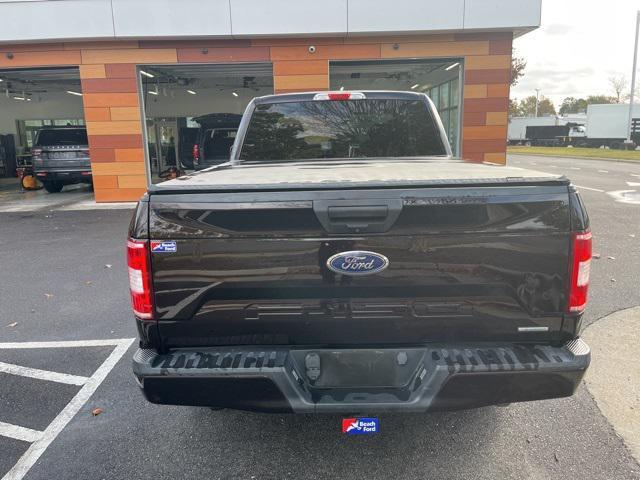 used 2018 Ford F-150 car, priced at $17,038