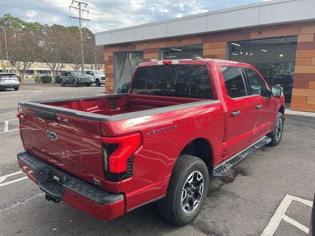 used 2023 Ford F-150 Lightning car, priced at $40,588