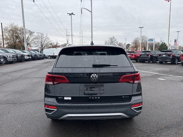 used 2023 Volkswagen Taos car, priced at $22,999