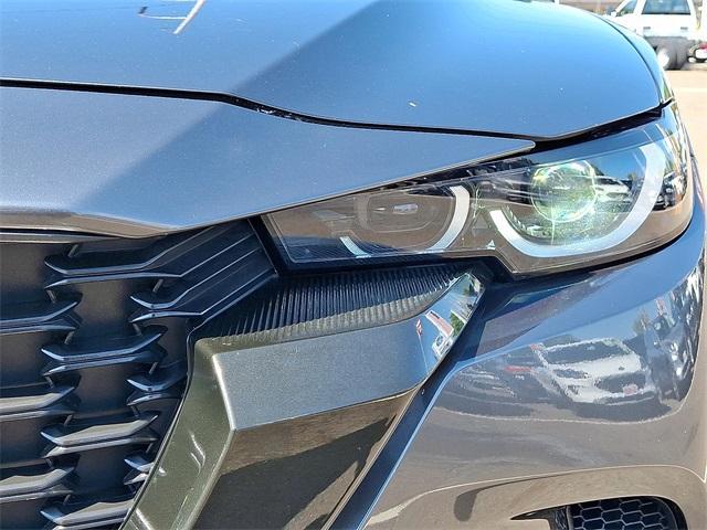 used 2024 Mazda CX-50 car, priced at $26,999