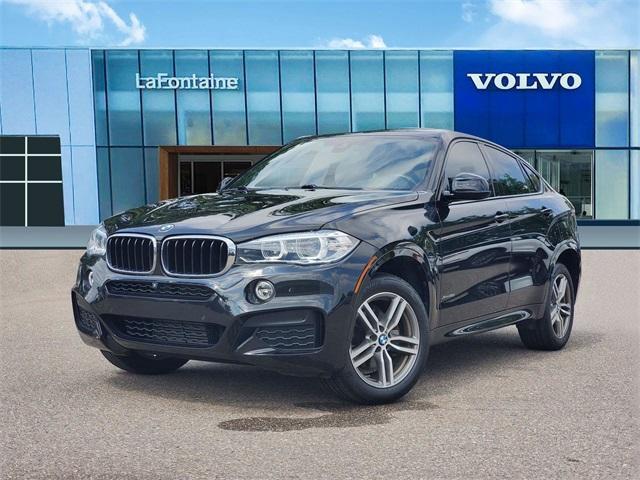 used 2019 BMW X6 car, priced at $27,900