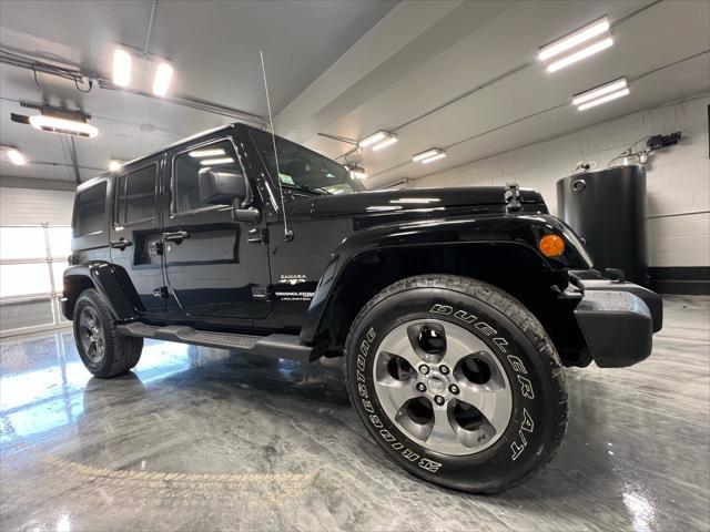 used 2018 Jeep Wrangler JK Unlimited car, priced at $26,985