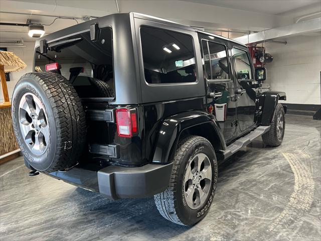 used 2018 Jeep Wrangler JK Unlimited car, priced at $26,985