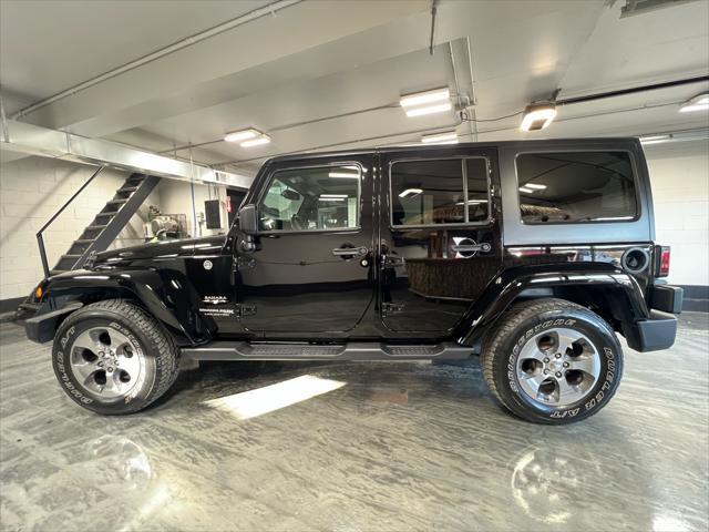 used 2018 Jeep Wrangler JK Unlimited car, priced at $26,985