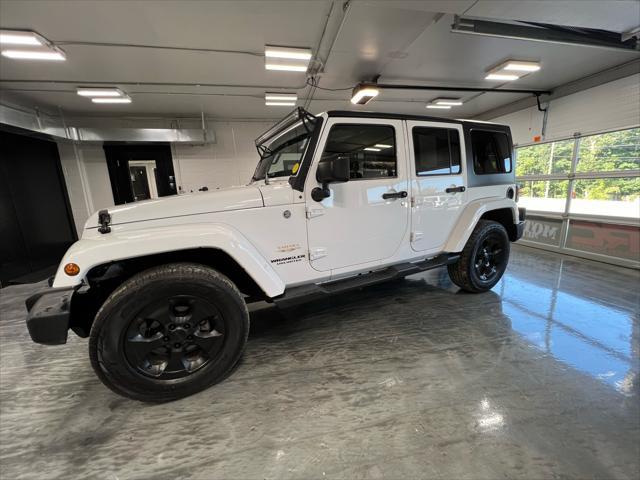 used 2015 Jeep Wrangler Unlimited car, priced at $21,985