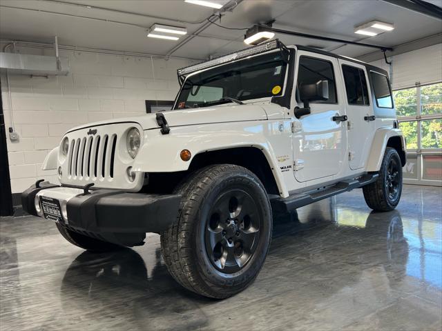 used 2015 Jeep Wrangler Unlimited car, priced at $21,985