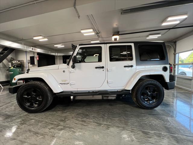 used 2015 Jeep Wrangler Unlimited car, priced at $21,985