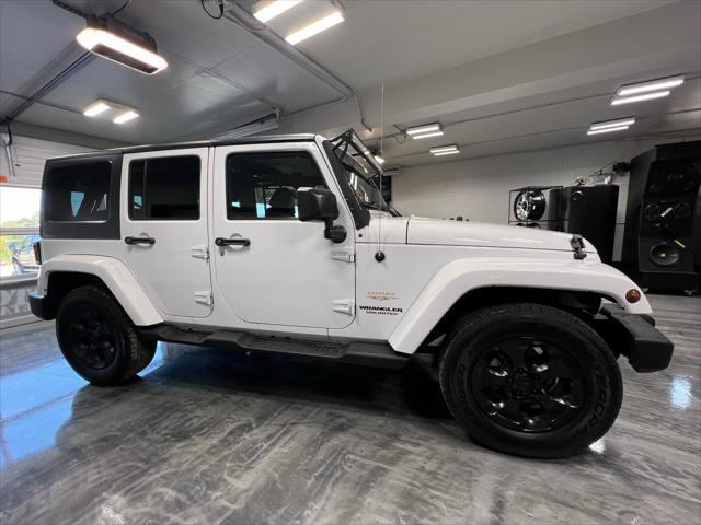 used 2015 Jeep Wrangler Unlimited car, priced at $21,985