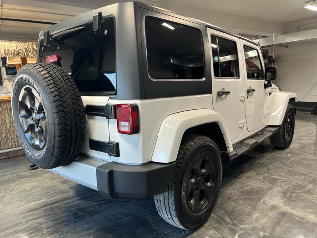 used 2015 Jeep Wrangler Unlimited car, priced at $21,985