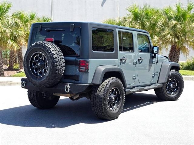used 2014 Jeep Wrangler Unlimited car, priced at $17,900