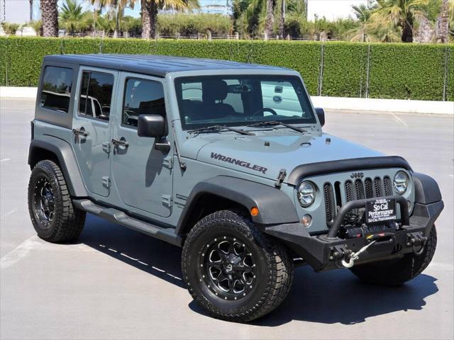 used 2014 Jeep Wrangler Unlimited car, priced at $17,900